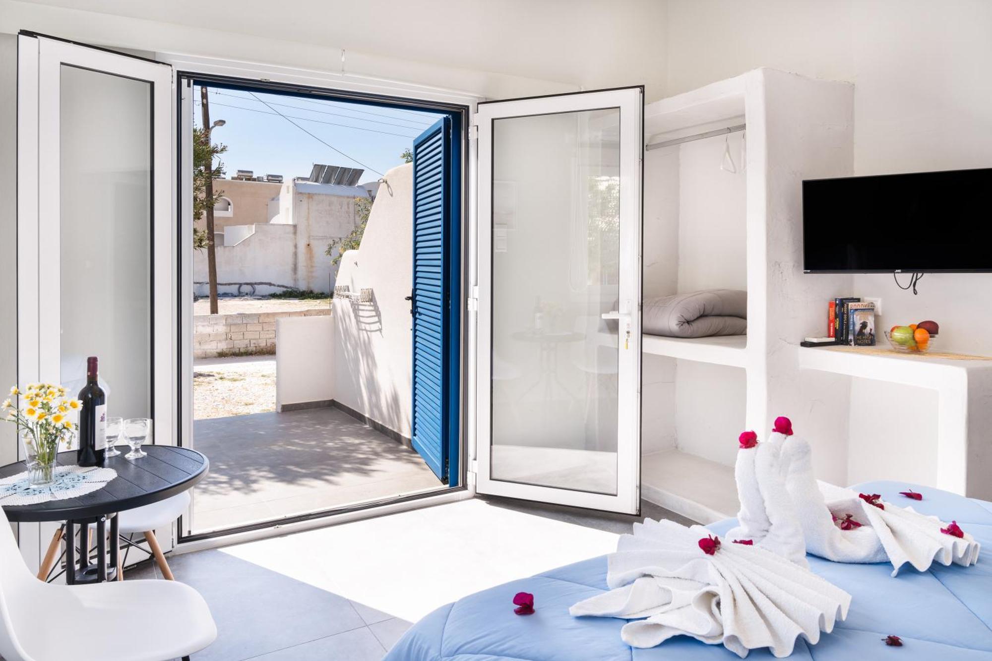 Aegean Blue Santorini Perissa Apartment Bagian luar foto